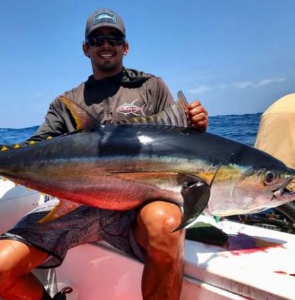 Man holding Tuna Fish