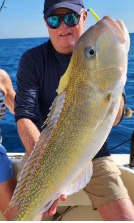 Man holding Golden Tile Fish